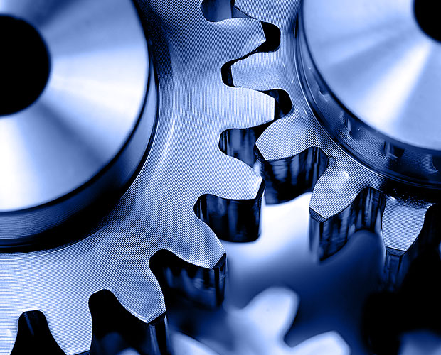 Gear & Hydraulic Oils close up of lubricated industrial gears